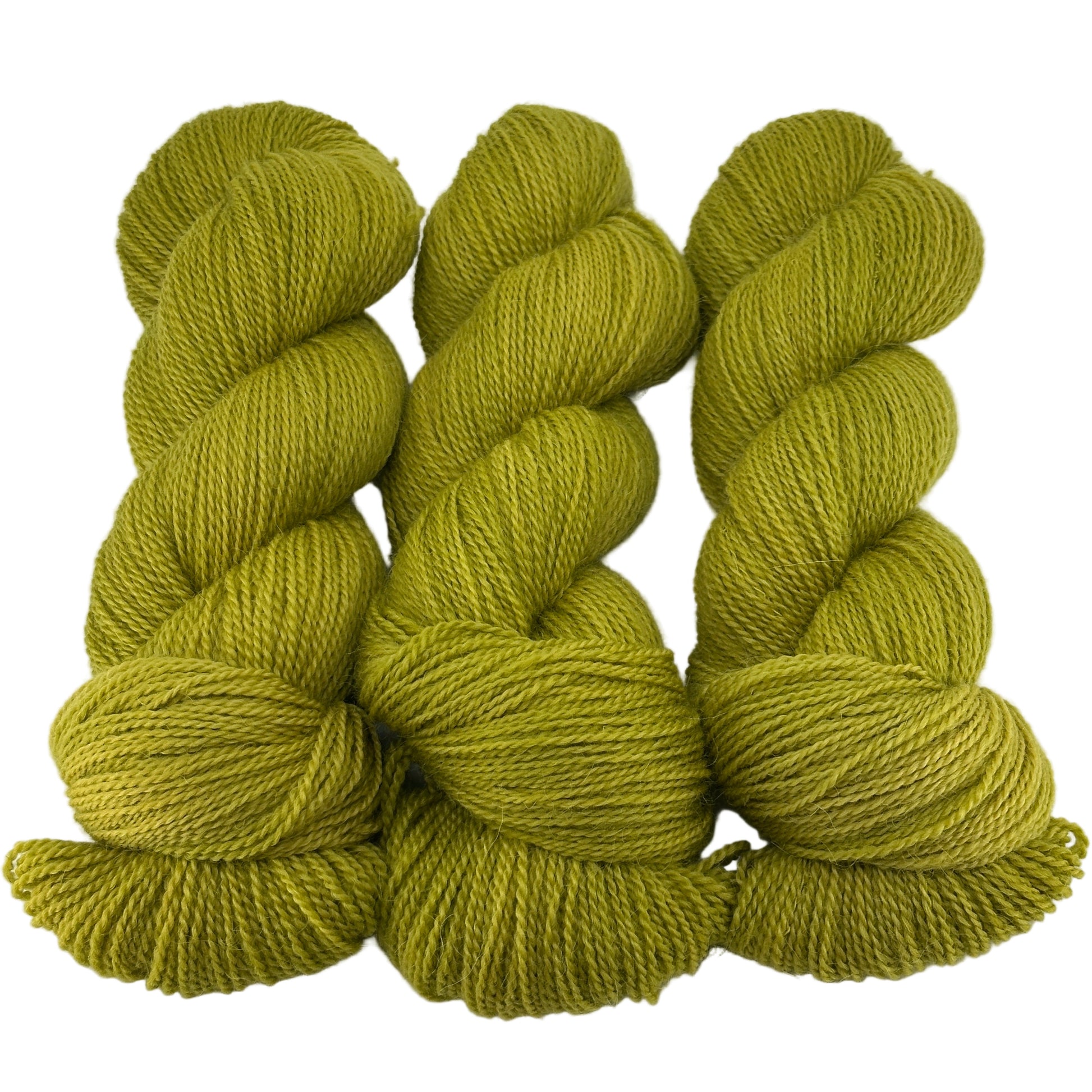 Three skeins of chartreuse green yarn on a white background